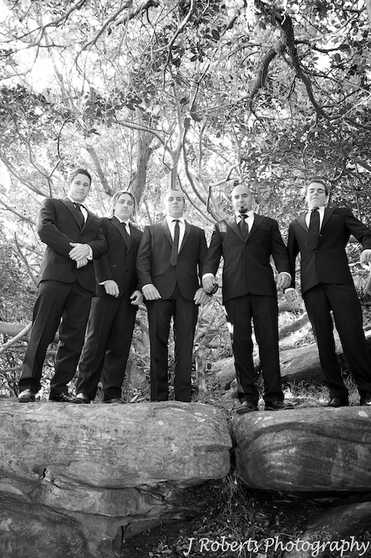 Groomsmen puffing their chests out - wedding photography sydney